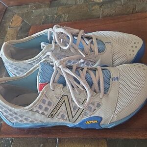 New Balance Light Blue and White Running Shoes. New Balance Minimus WT20GB.  8.5